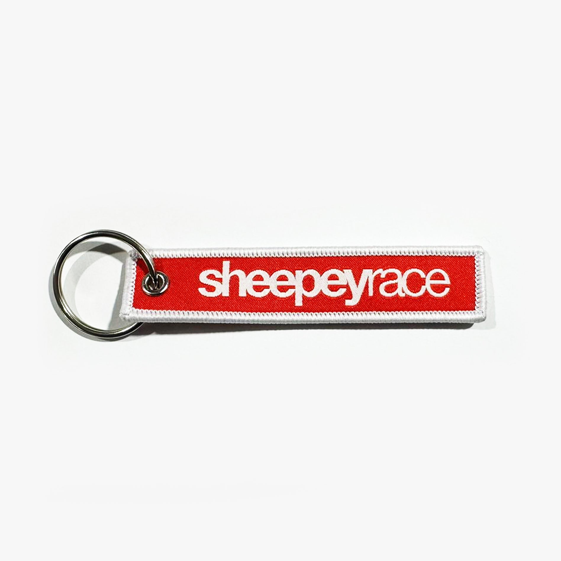 SHEEPEY Jet Tag Red